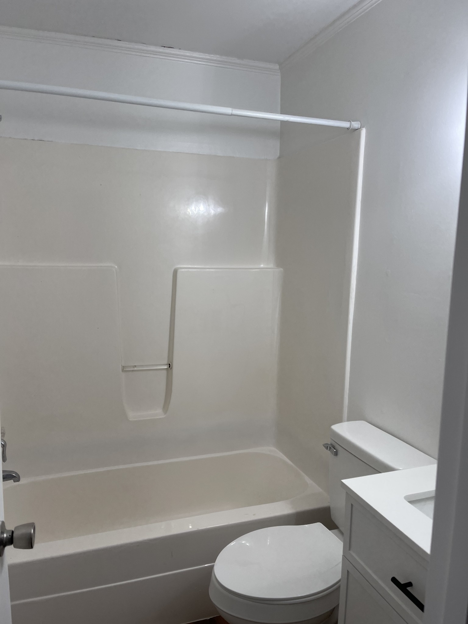 255 Maple Street Savannah, TN 38372 - Photo 16 of 20 a bathroom with a toilet and a bathtub