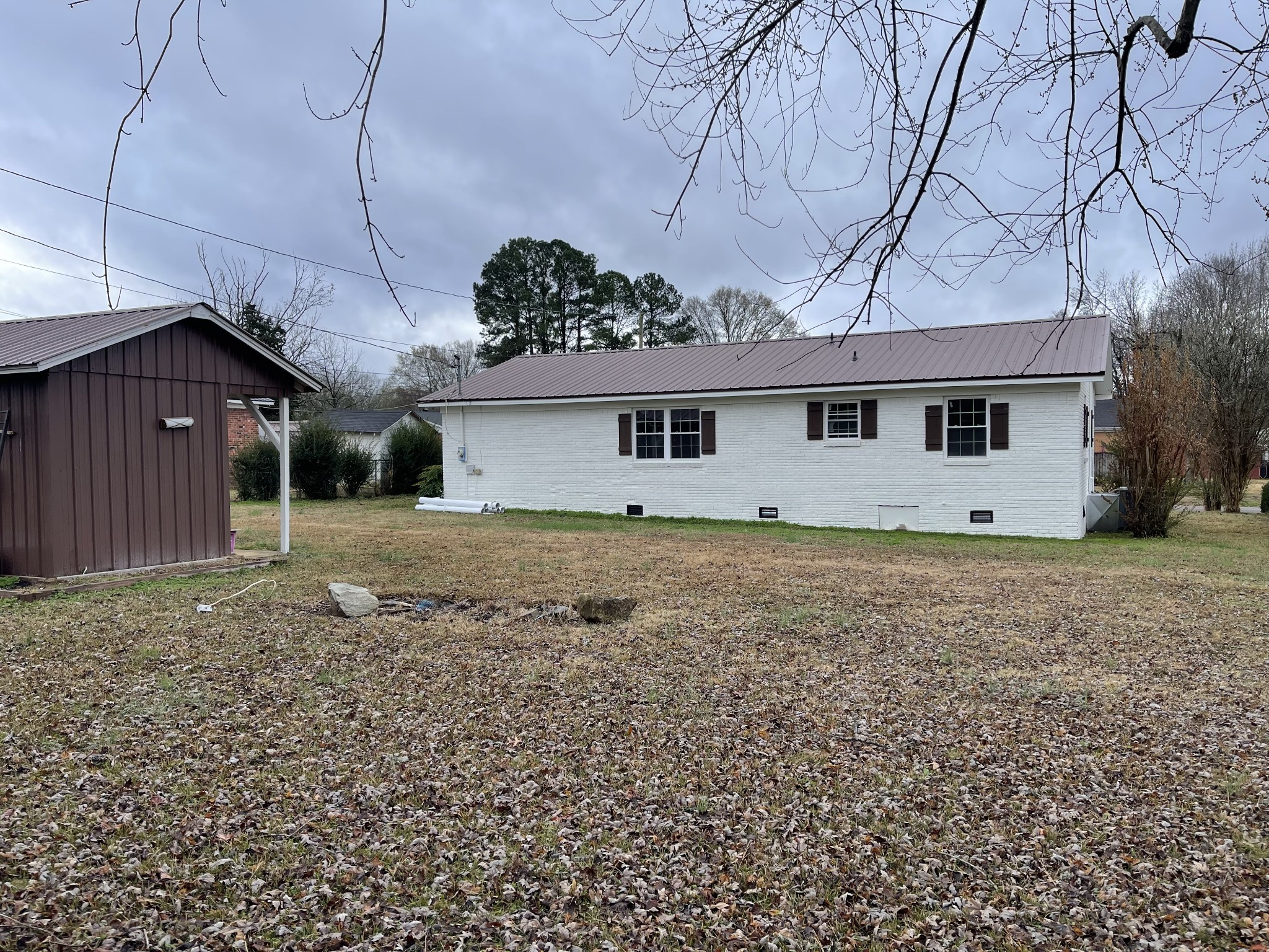 255 Maple Street Savannah, TN 38372 - Photo 17 of 20 a house view with a backyard space