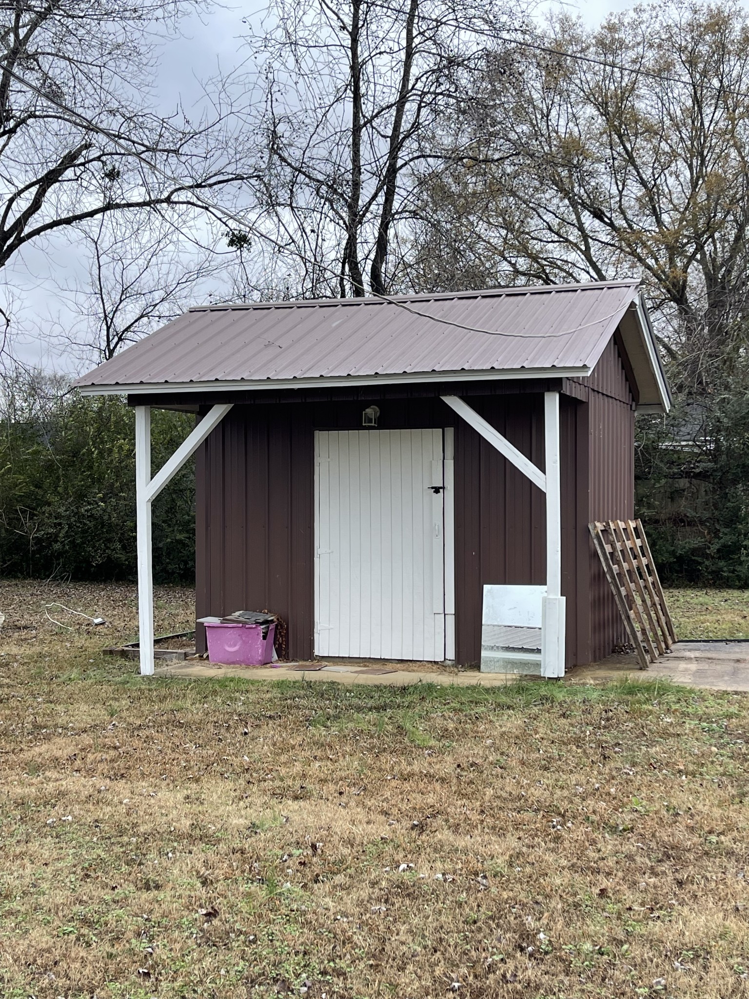 255 Maple Street Savannah, TN 38372 - Photo 19 of 20 a view of wooden house with large trees