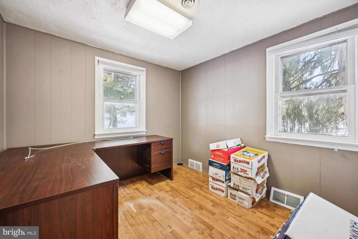 4510 Church Road Mount Laurel, NJ 08054 - Photo 13 of 14 a living room with a bed and a window