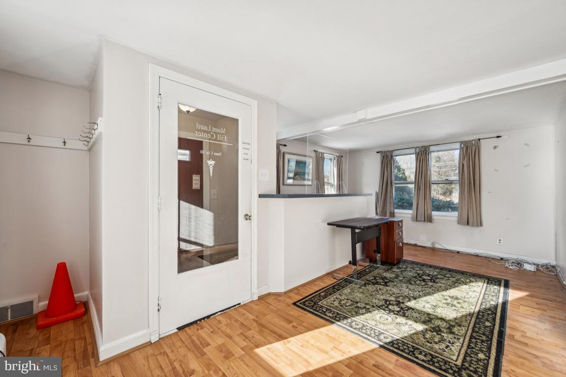 4510 Church Road Mount Laurel, NJ 08054 - Photo 8 of 14 a bedroom with a bed and wooden floor