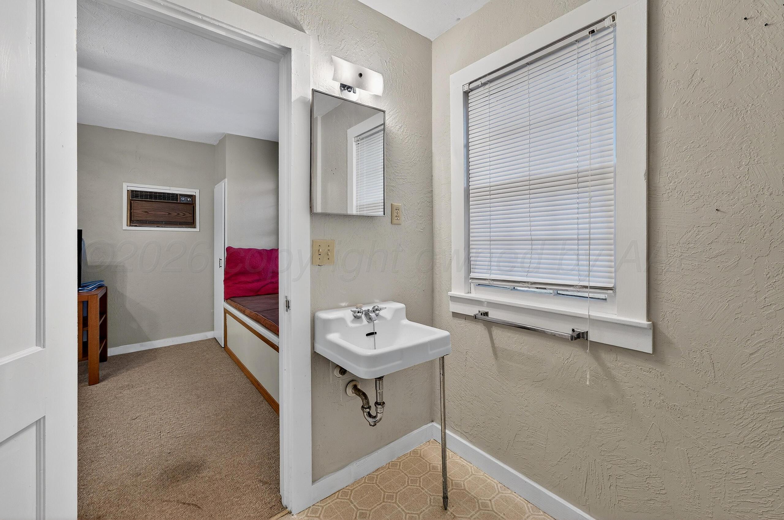 300 North Vine Street Claude, TX 79019 - Photo 56 of 56 056_Apartment Bath-2