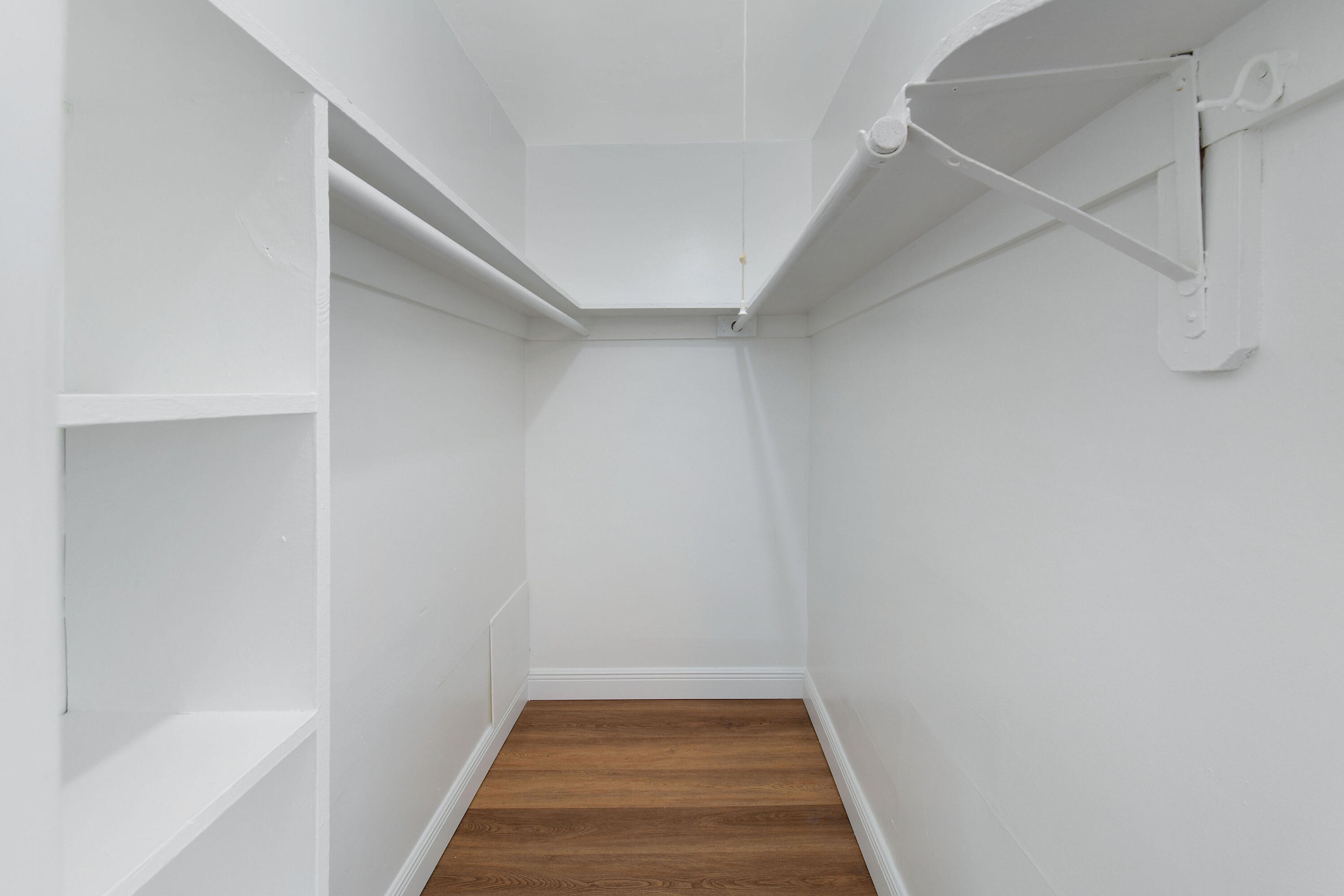 901 North F Street, Unit 8 Lake Worth Beach, FL 33460 - Photo 12 of 15 a view of a hallway with wooden floor