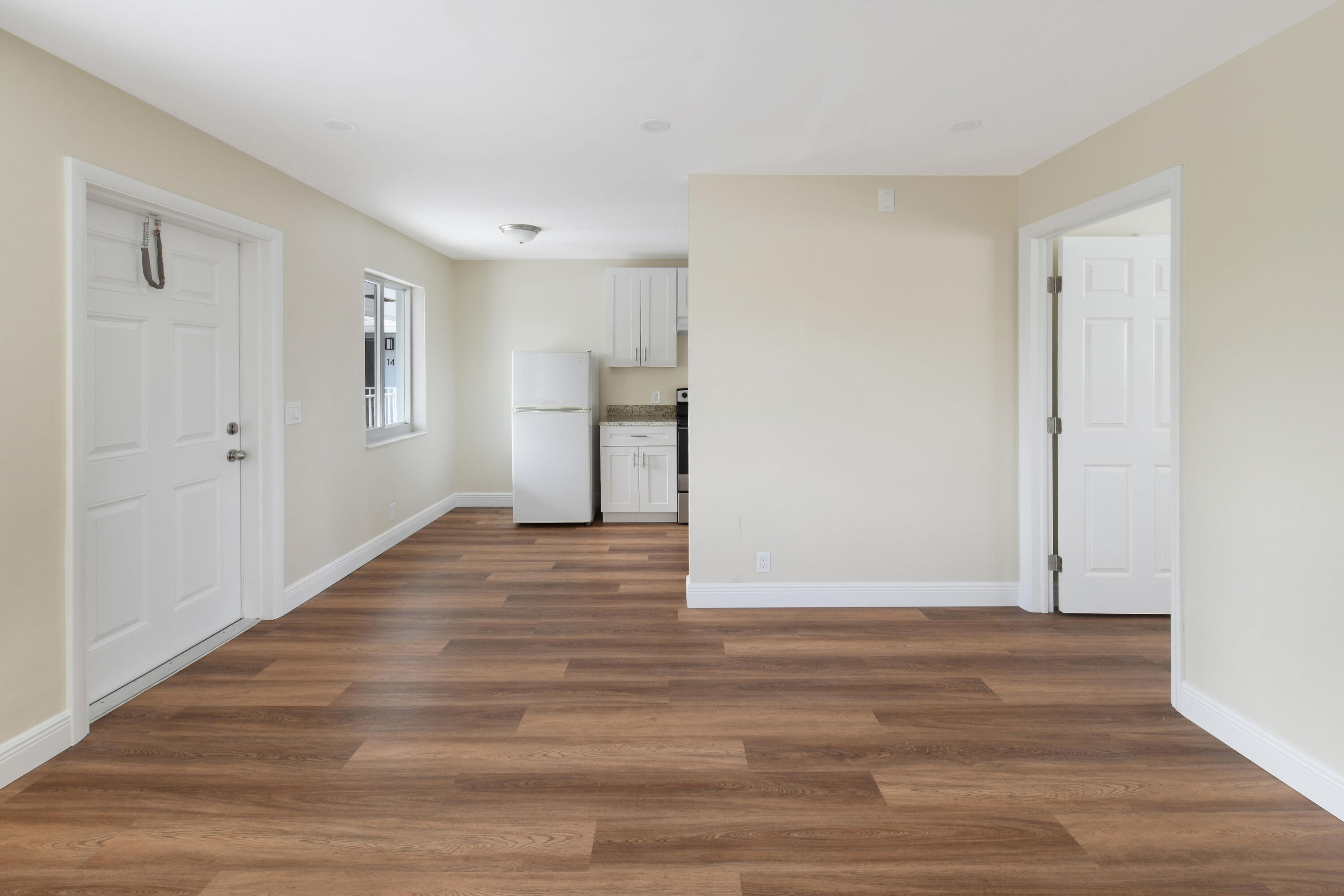 901 North F Street, Unit 8 Lake Worth Beach, FL 33460 - Photo 3 of 15 a view of empty room with wooden floor