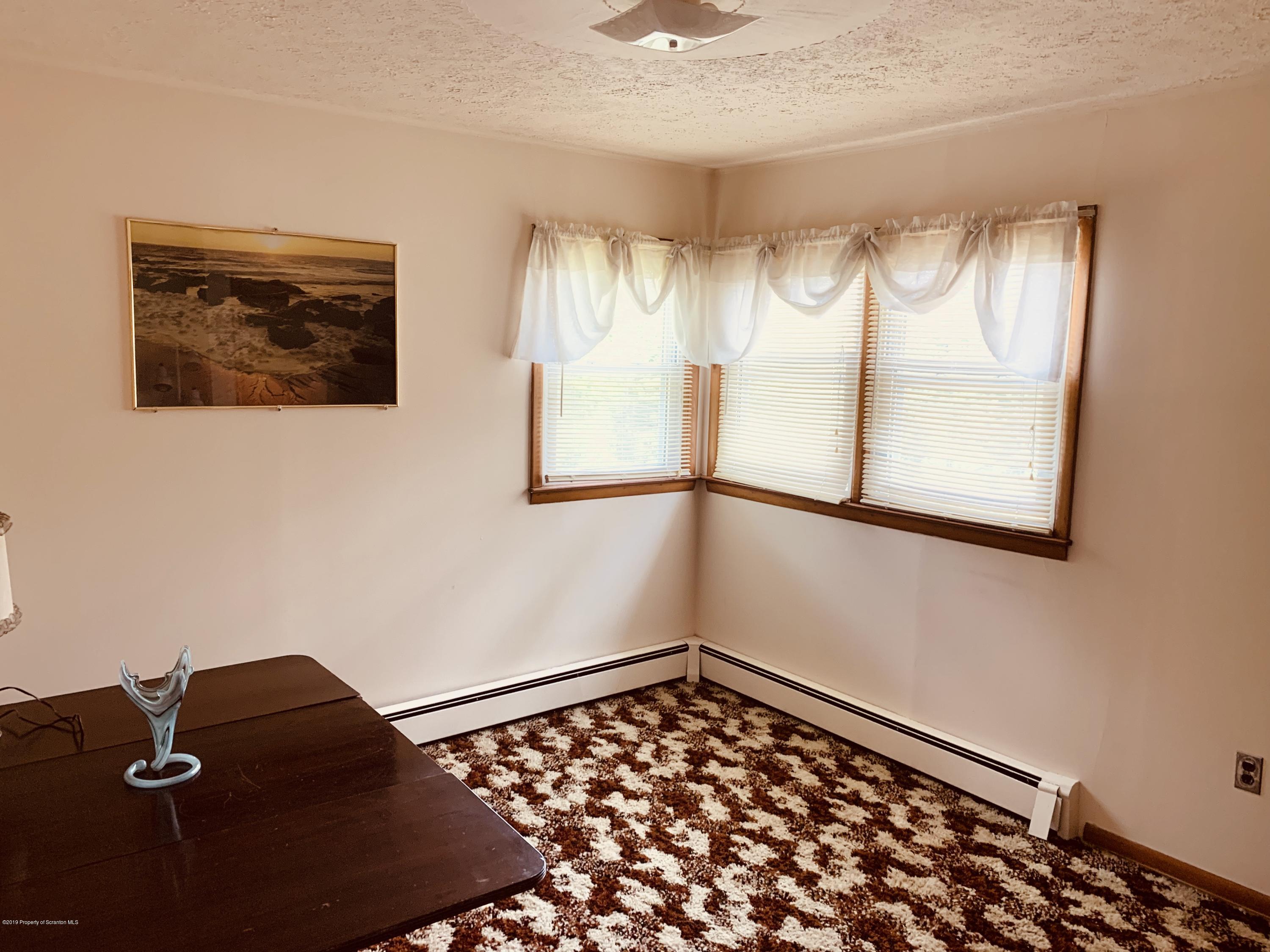 797 Cortez Road Lake Ariel, PA 18436 - Photo 11 of 15 a bedroom with a bed and a window