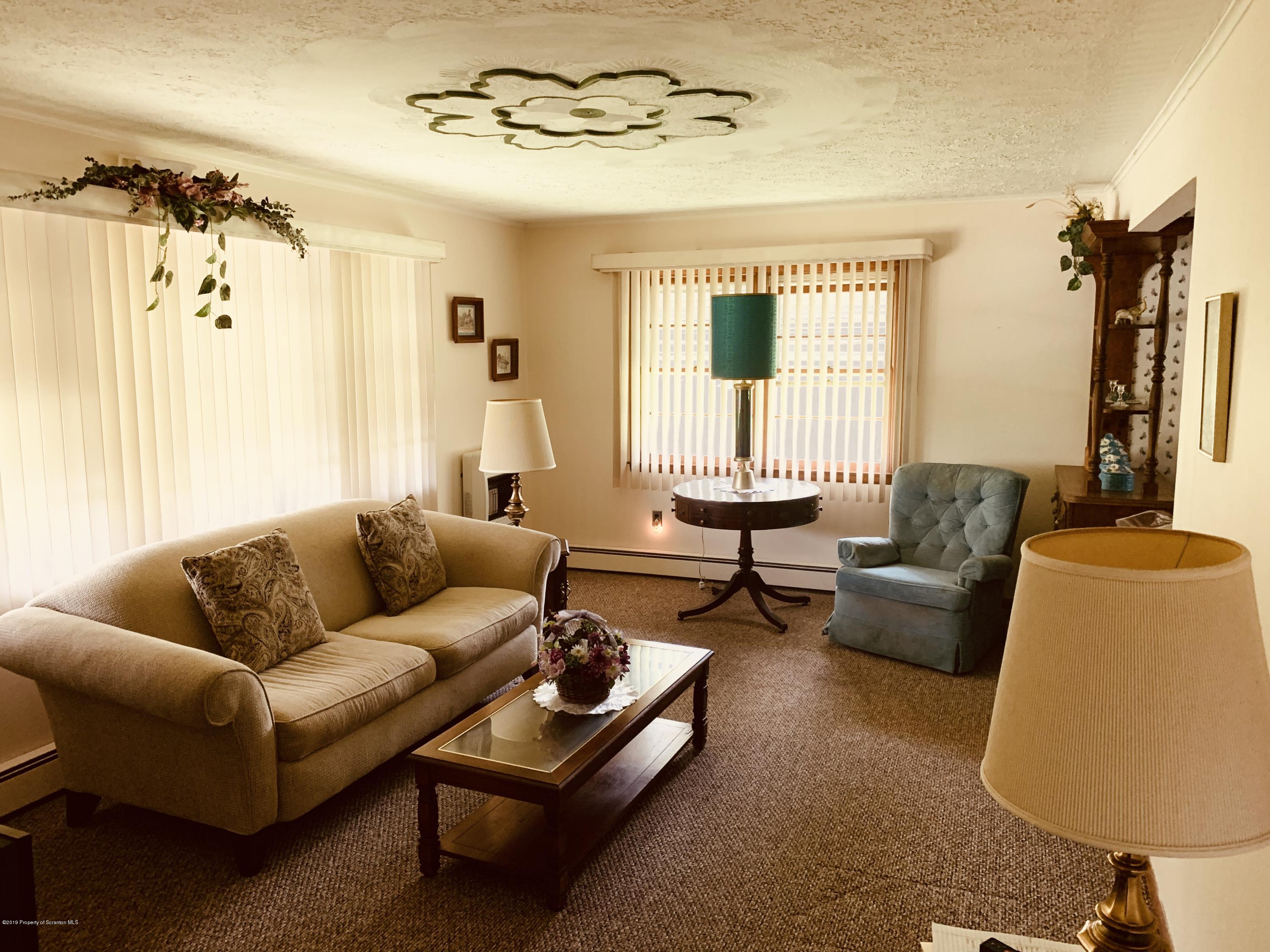 797 Cortez Road Lake Ariel, PA 18436 - Photo 4 of 15 a living room with furniture and a large window