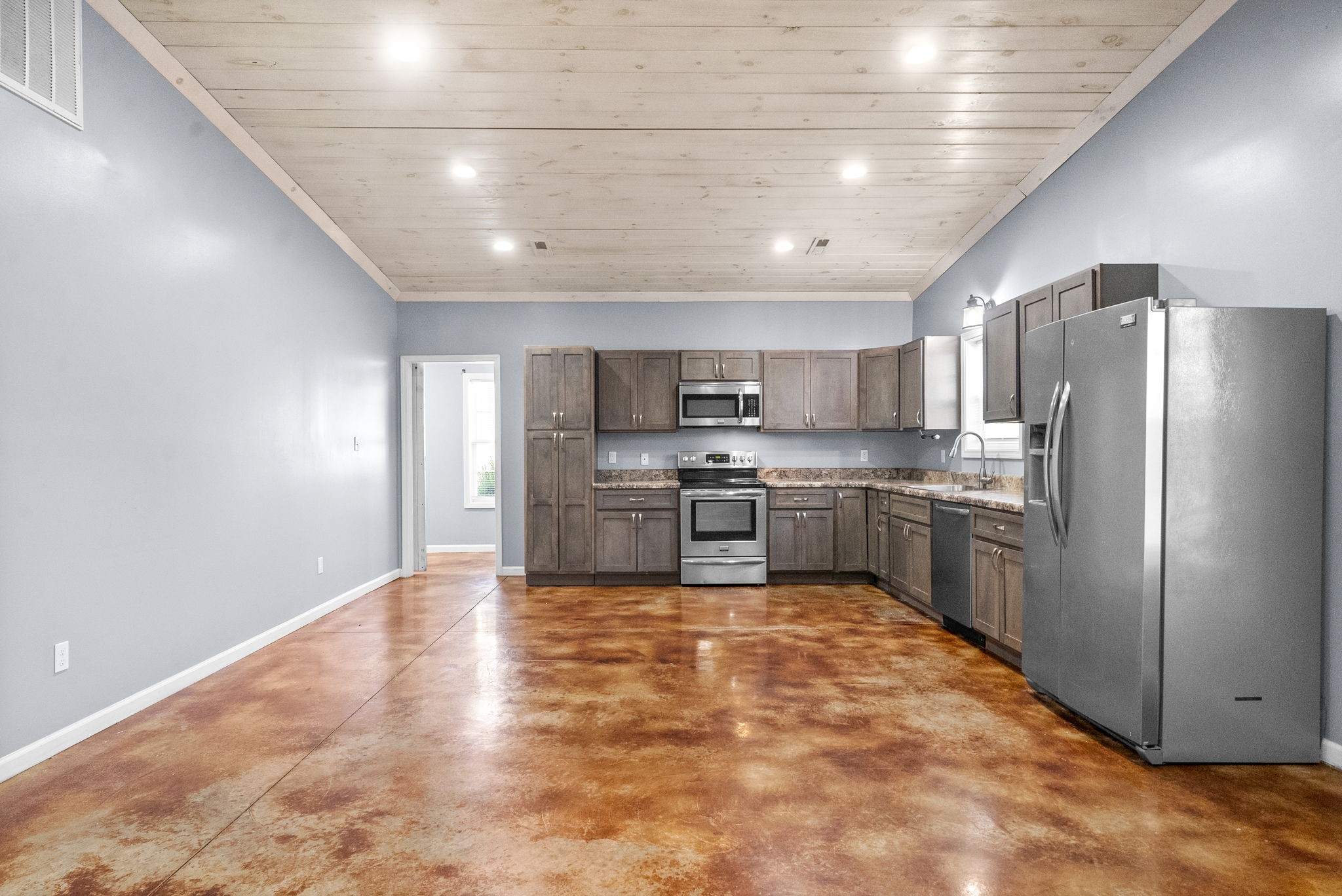 113 Tinsley Drive Pembroke, KY 42266 - Photo 11 of 28 a large kitchen with cabinets and stainless steel appliances