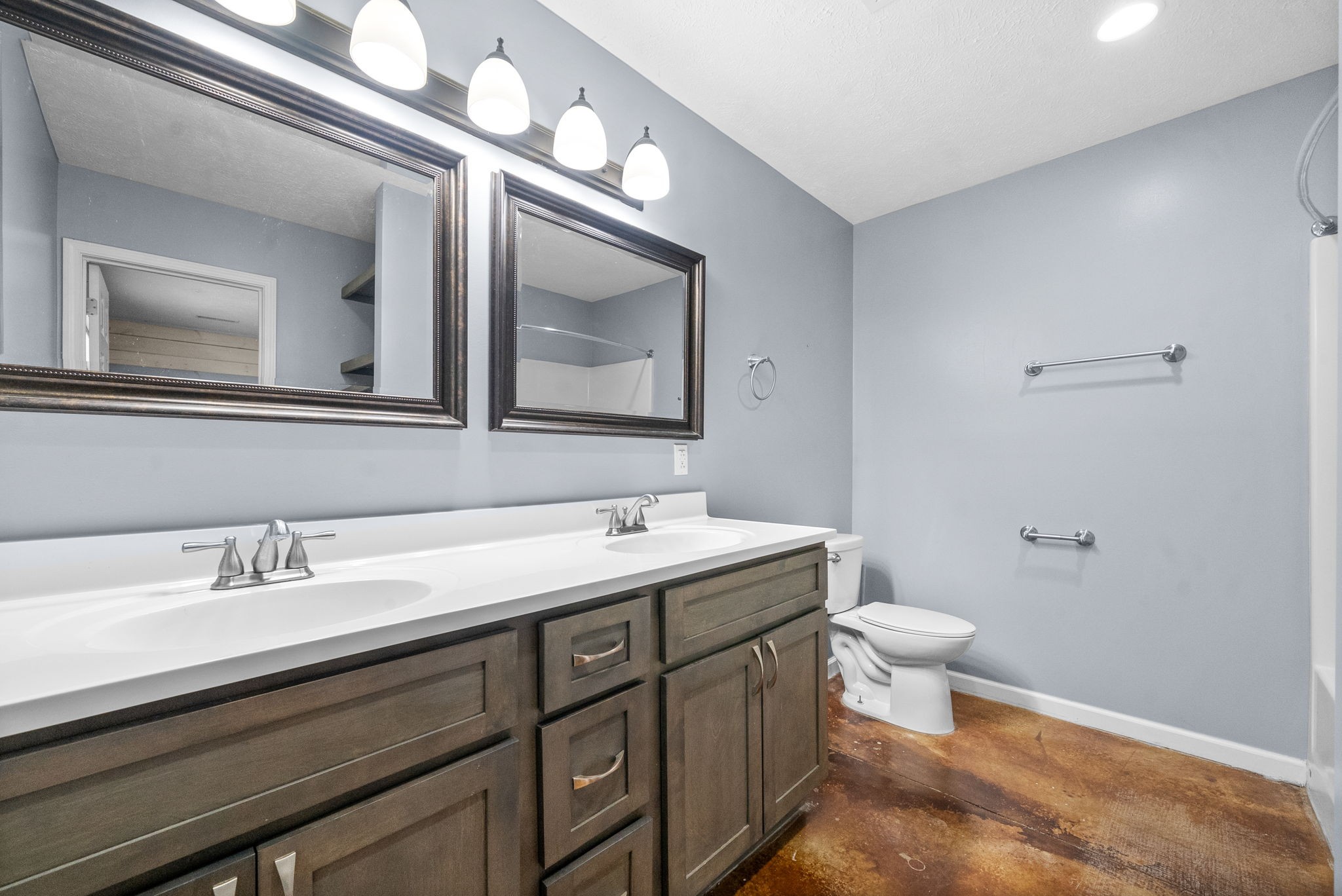 113 Tinsley Drive Pembroke, KY 42266 - Photo 18 of 28 a bathroom with a toilet sink and mirror