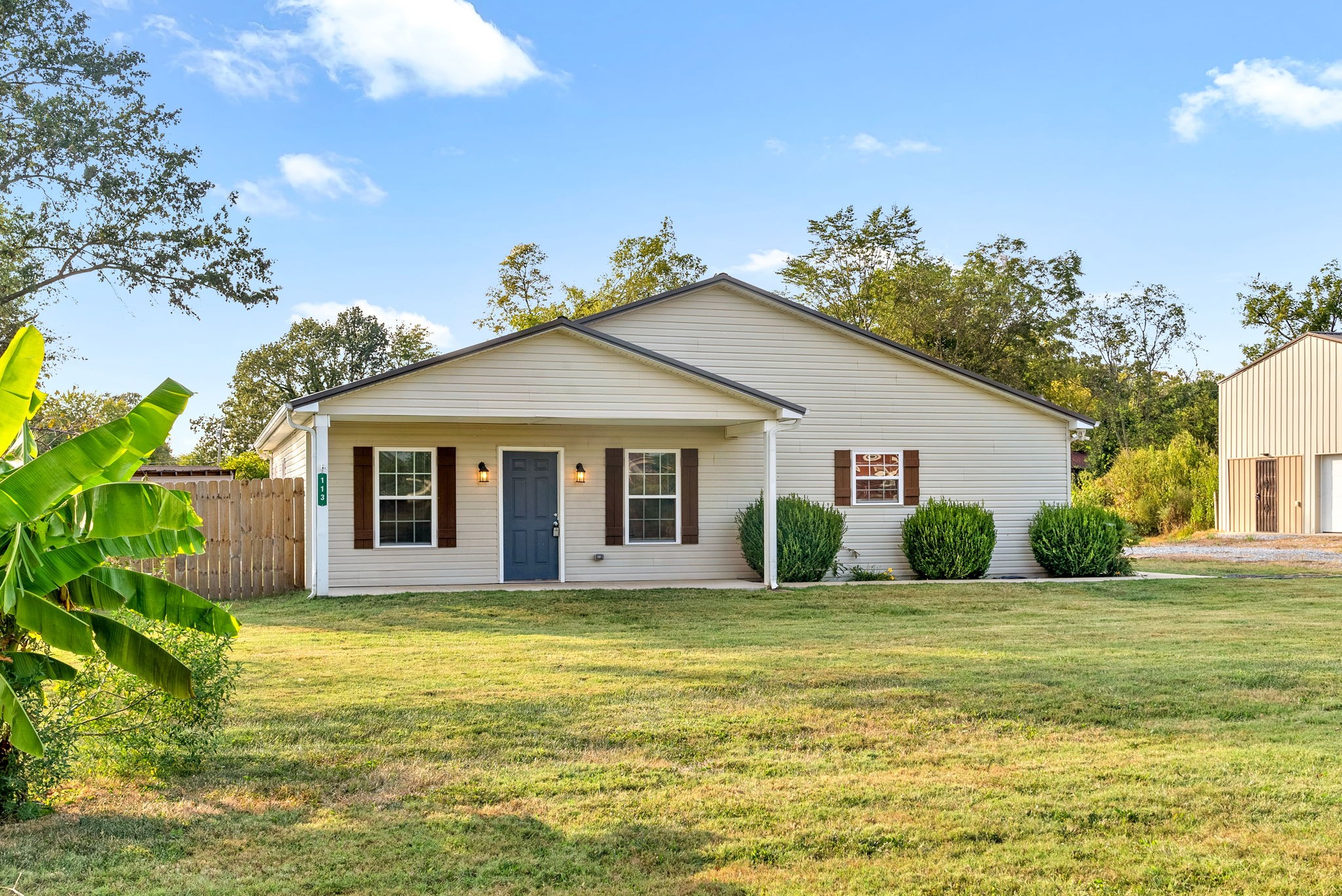 113 Tinsley Drive Pembroke, KY 42266 - Photo 2 of 28 a front view of house with yard and green space
