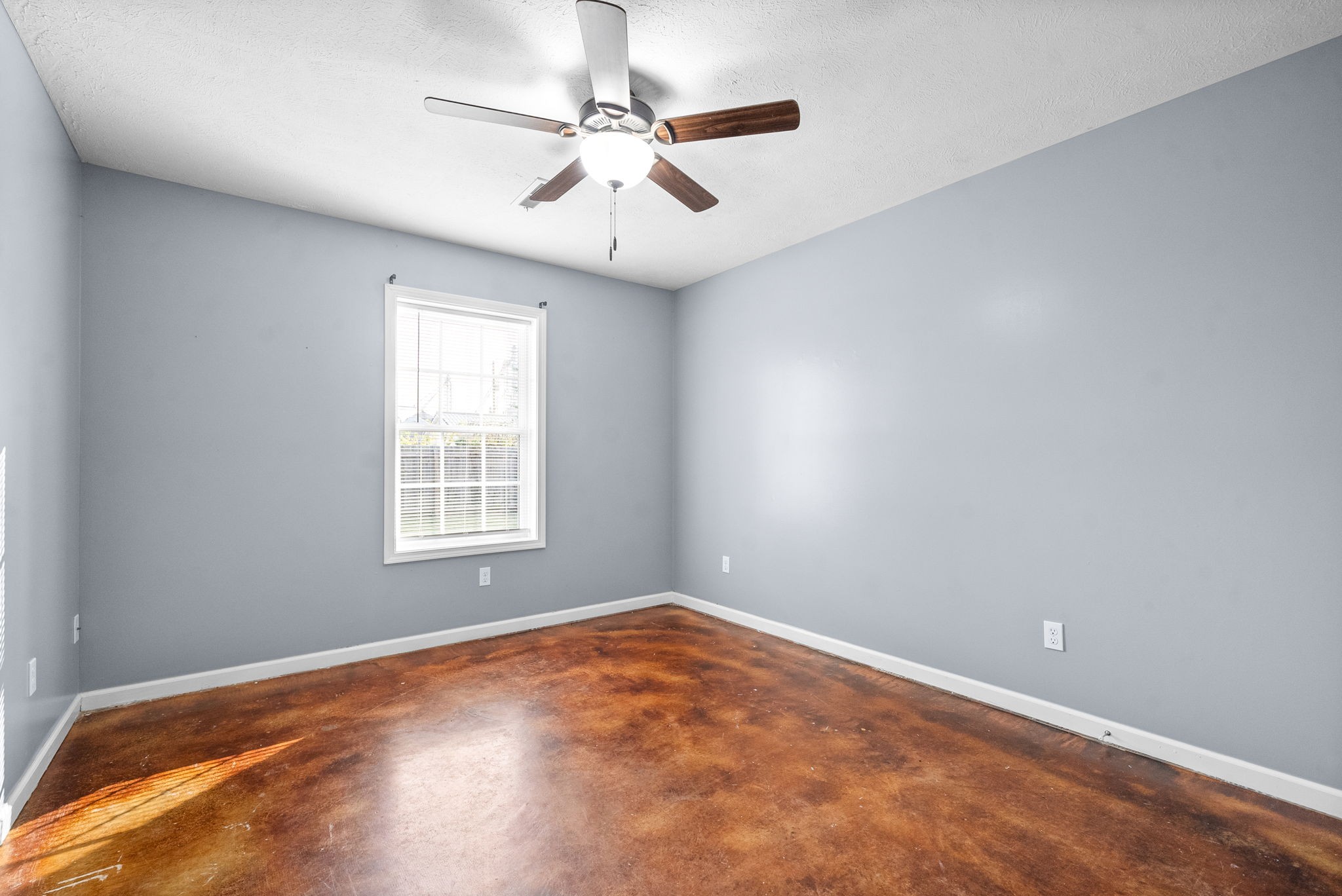113 Tinsley Drive Pembroke, KY 42266 - Photo 22 of 28 an empty room with a window and a fan