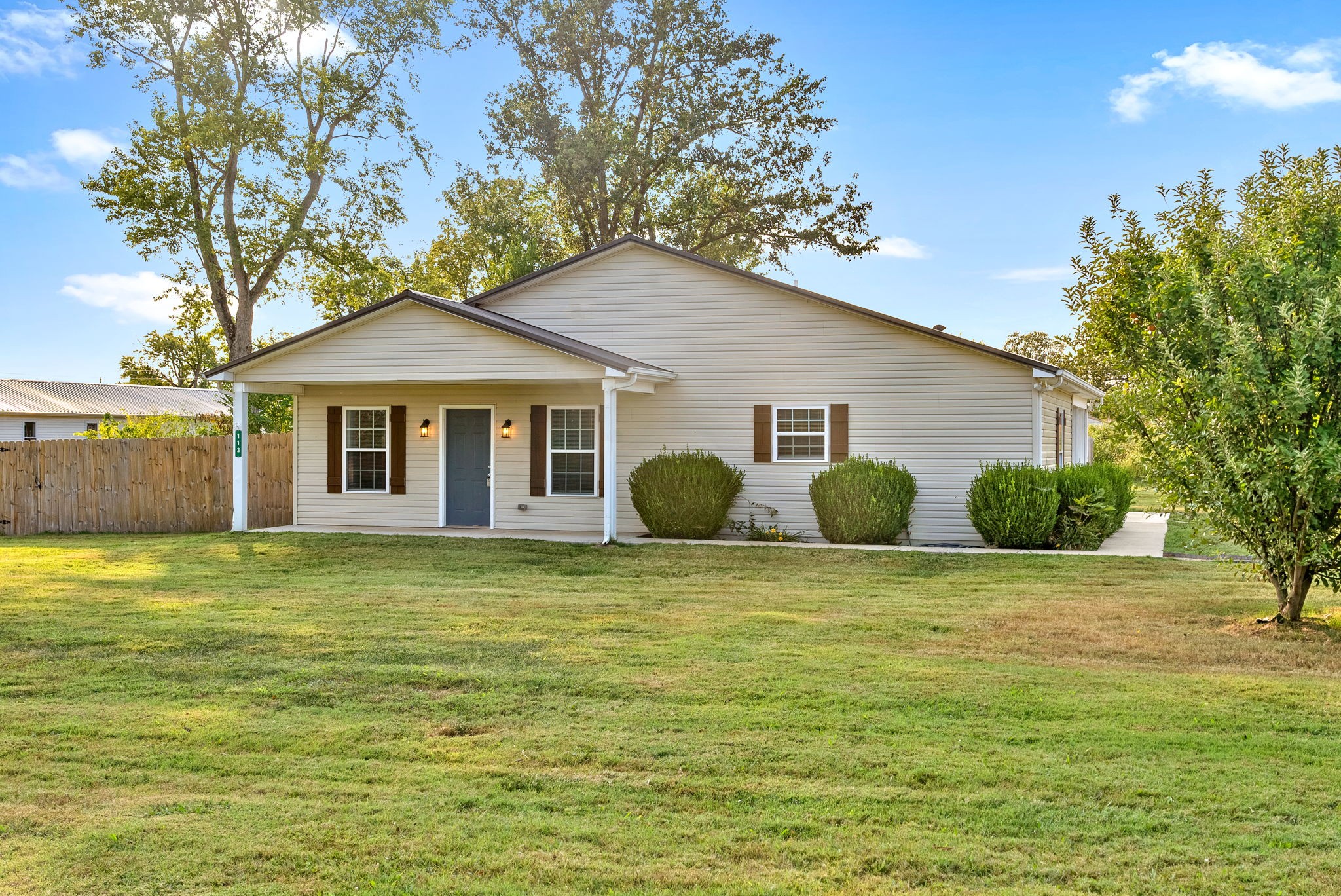 113 Tinsley Drive Pembroke, KY 42266 - Photo 4 of 28 a front view of a house with a garden
