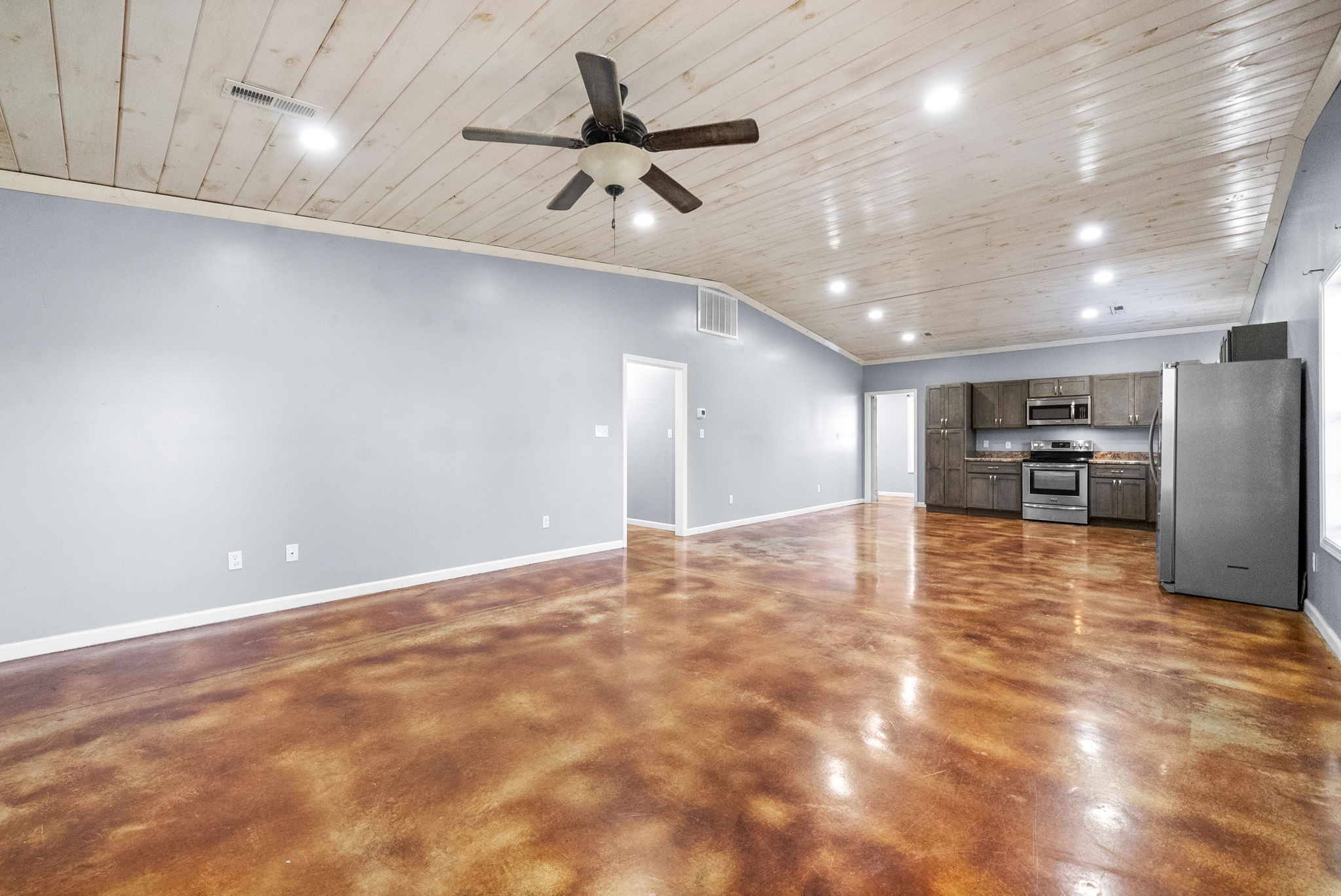 113 Tinsley Drive Pembroke, KY 42266 - Photo 7 of 28 a view of a kitchen with a sink and a refrigerator