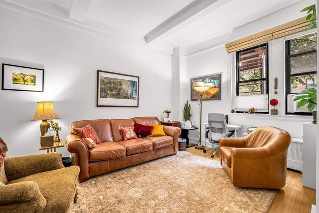 a living room with furniture or couch and a window