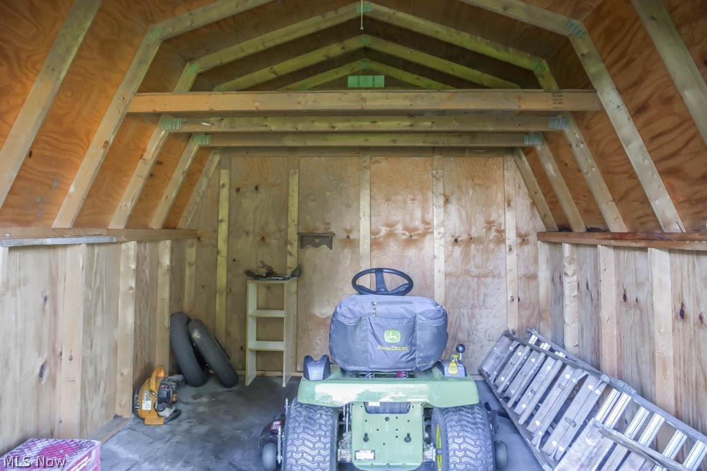 849 Pearlman Road Akron, OH 44319 - Photo 23 of 25 The shed has a lofted shelf.