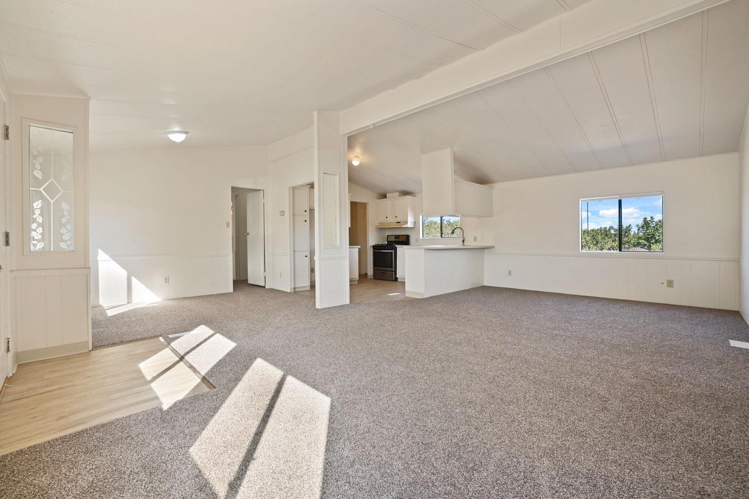 3443 Kansas Avenue Modesto, CA 95358 - Photo 23 of 45 a living room with furniture and a window