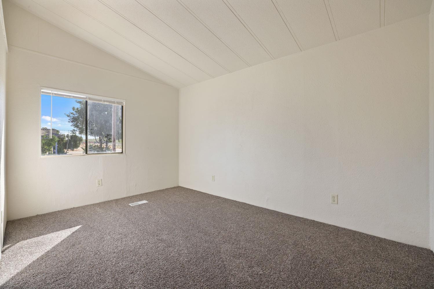 3443 Kansas Avenue Modesto, CA 95358 - Photo 31 of 45 a view of an empty room with a window