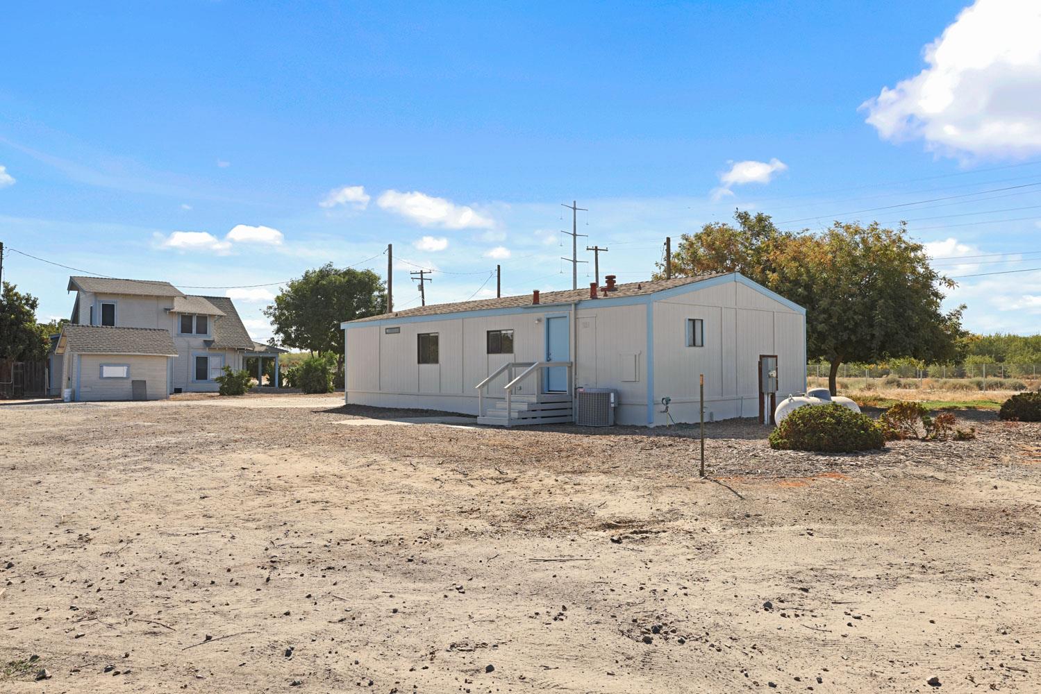 3443 Kansas Avenue Modesto, CA 95358 - Photo 34 of 45 a view of parking house with a yard