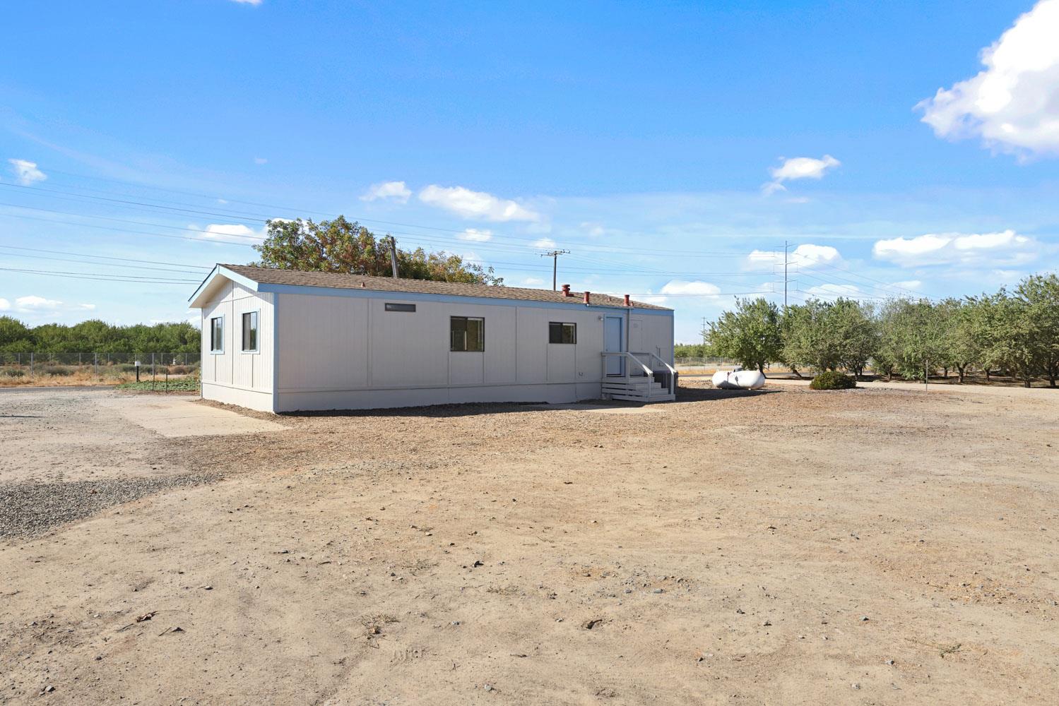 3443 Kansas Avenue Modesto, CA 95358 - Photo 35 of 45 a view of a house with a yard
