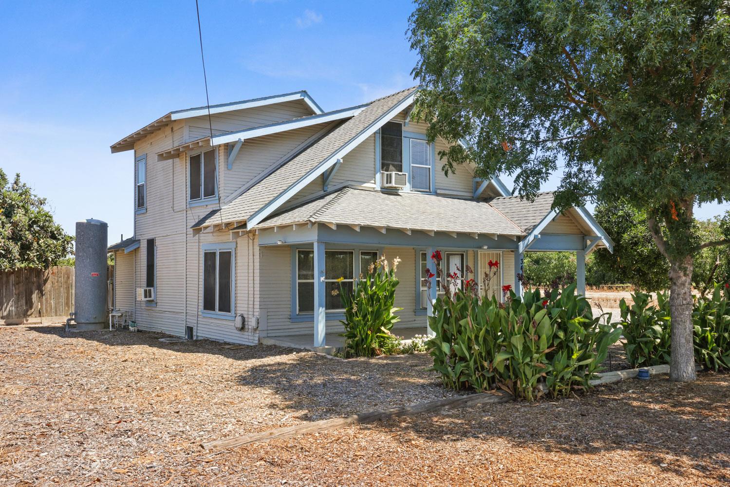 3443 Kansas Avenue Modesto, CA 95358 - Photo 5 of 45 a front view of a house with garden