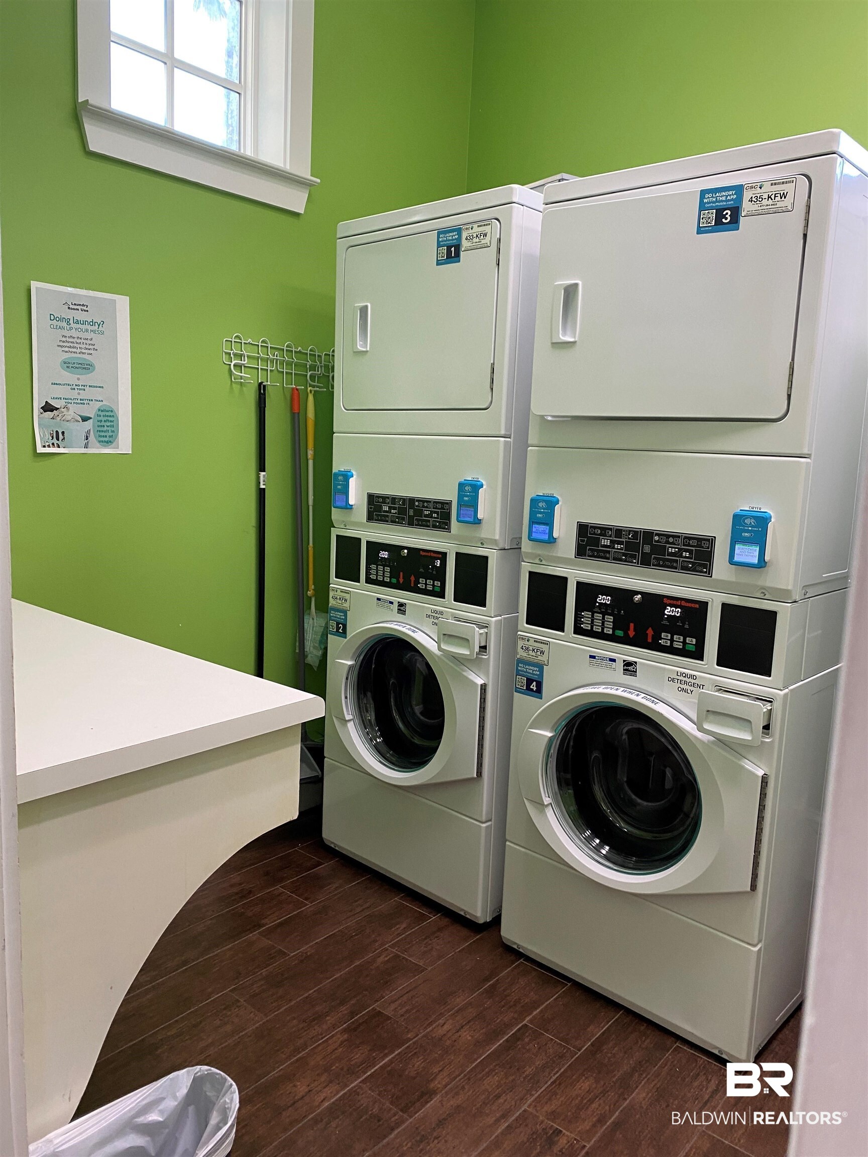 12451 Gateway Drive Elberta, AL 36530 - Photo 34 of 47 Community laundry room featuring stacked washer / dryer