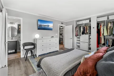 a bedroom with a bed and furniture