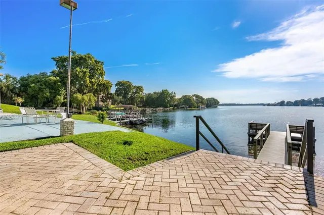 a view of a swimming pool with a lounge chairs