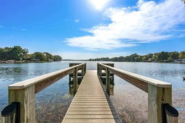 a view of wooden floor and lake