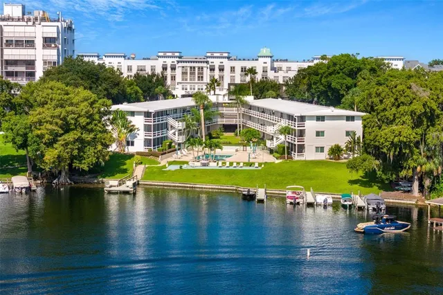 a view of swimming pool with outdoor seating and yard