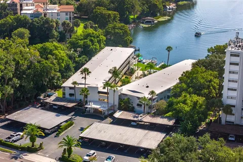 an aerial view of a house with outdoor space