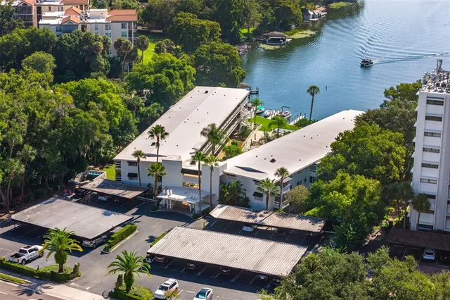 an aerial view of a house with outdoor space