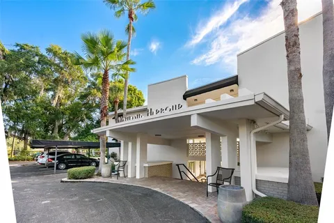 a view of multiple houses with outdoor space