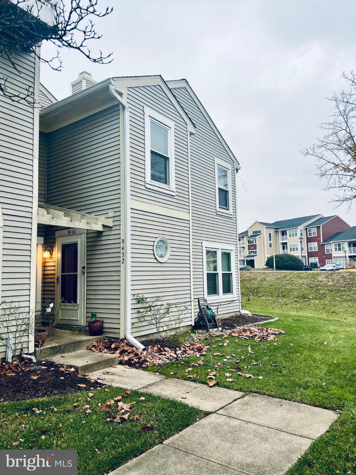 Charming corner unit with inviting entrance.