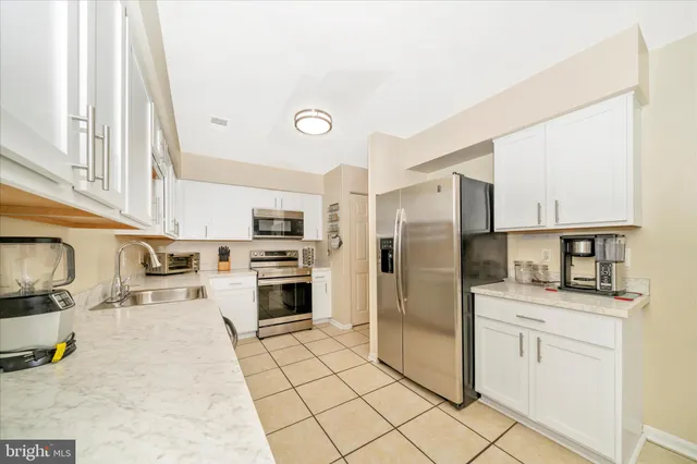 $300,000 | 9432 Nicklaus Lane, Unit 52, Laurel, MD 20708