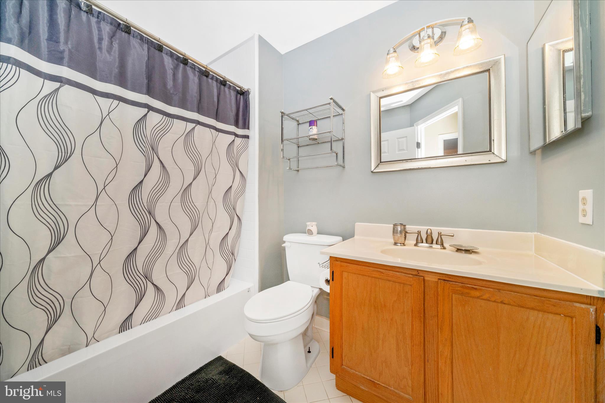 9432 Nicklaus Lane, Unit 52 Laurel, MD 20708 - Photo 36 of 53 Hall Bathroom
