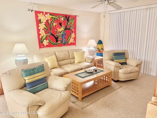 a living room with furniture and a couch