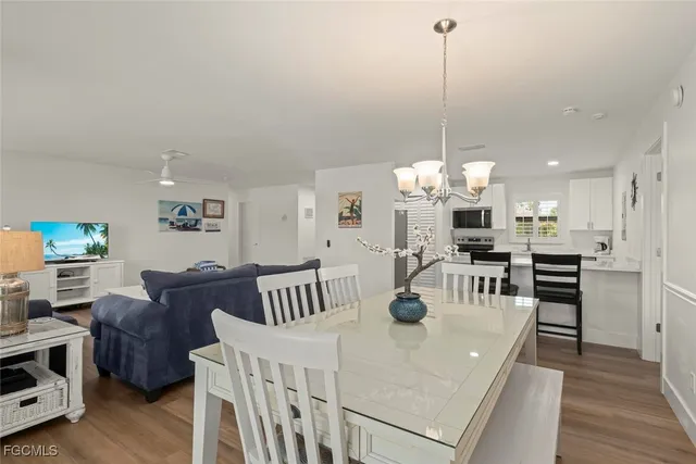 a view of kitchen and dining room with furniture
