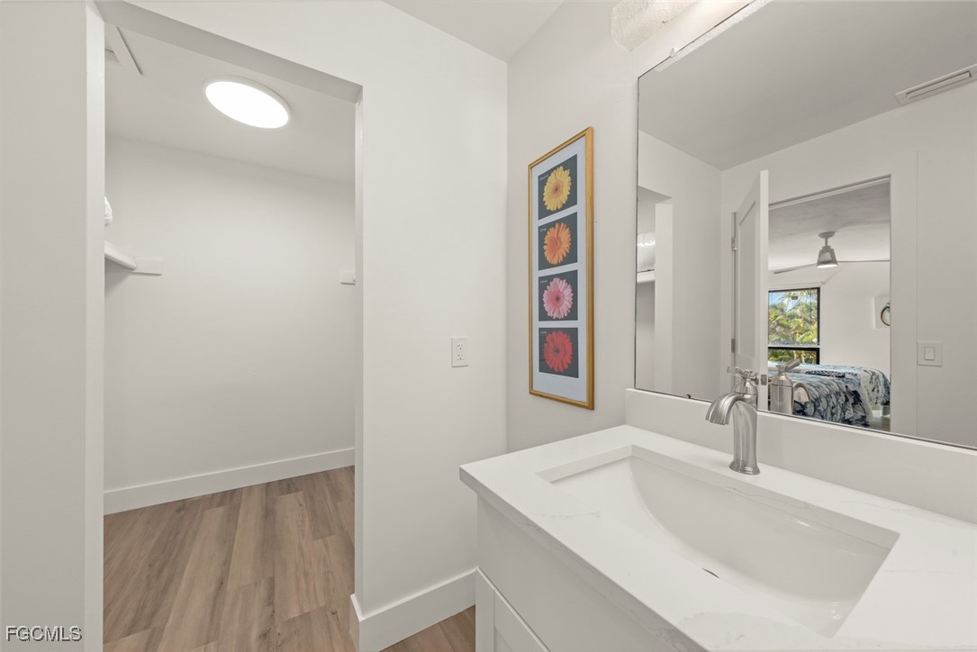 5117 Sea Bell Road, Unit D204 Sanibel, FL 33957 - Photo 39 of 50 a bathroom with a sink and a mirror