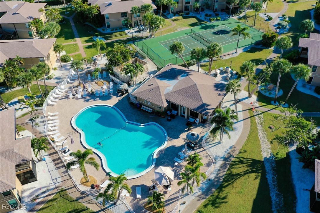 5117 Sea Bell Road, Unit D204 Sanibel, FL 33957 - Photo 46 of 50 an aerial view of a house with a yard and garden