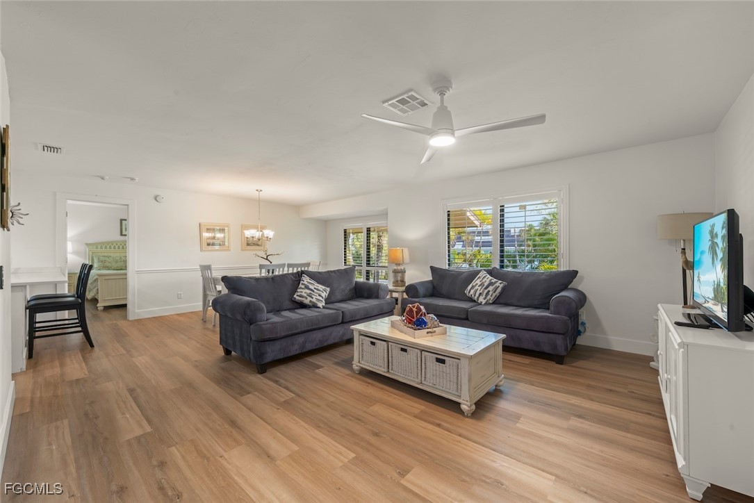 5117 Sea Bell Road, Unit D204 Sanibel, FL 33957 - Photo 10 of 50 a living room with furniture and a flat screen tv
