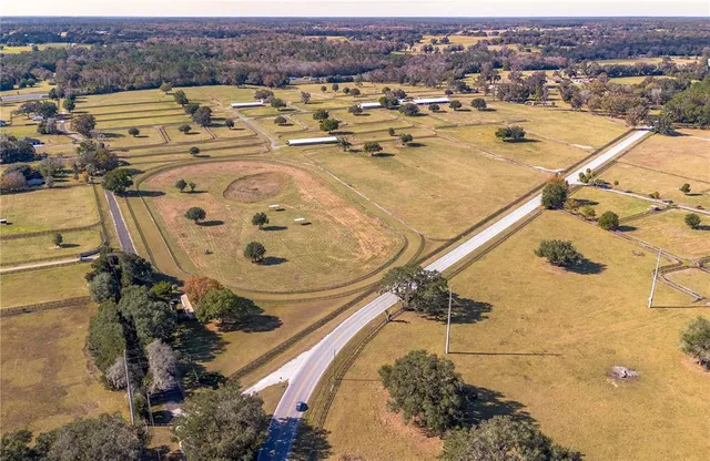 a view of a lake with a yard