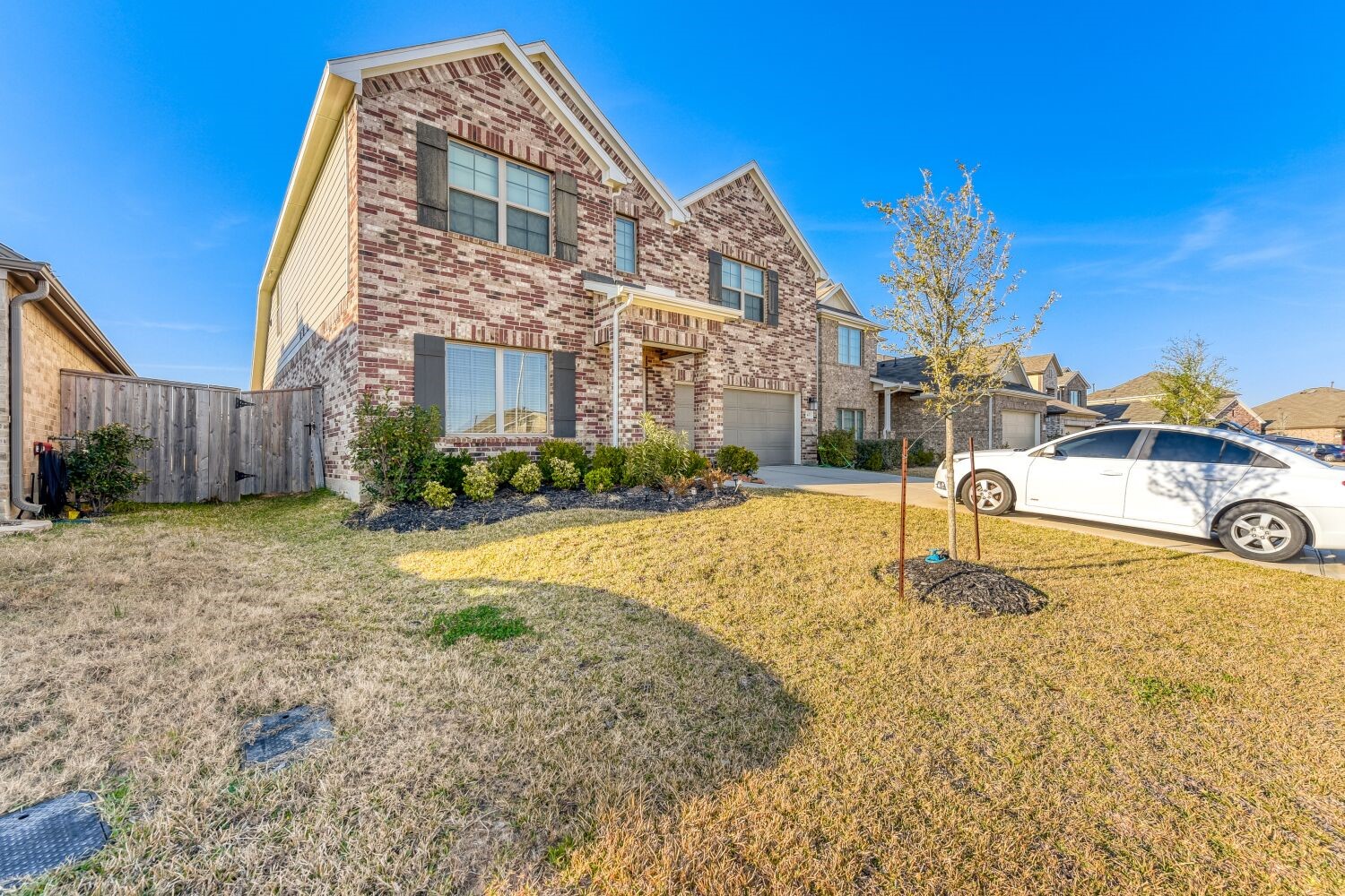 437 Ridge Palm Road Magnolia, TX 77354 - Photo 2 of 31 a front view of a house with a yard