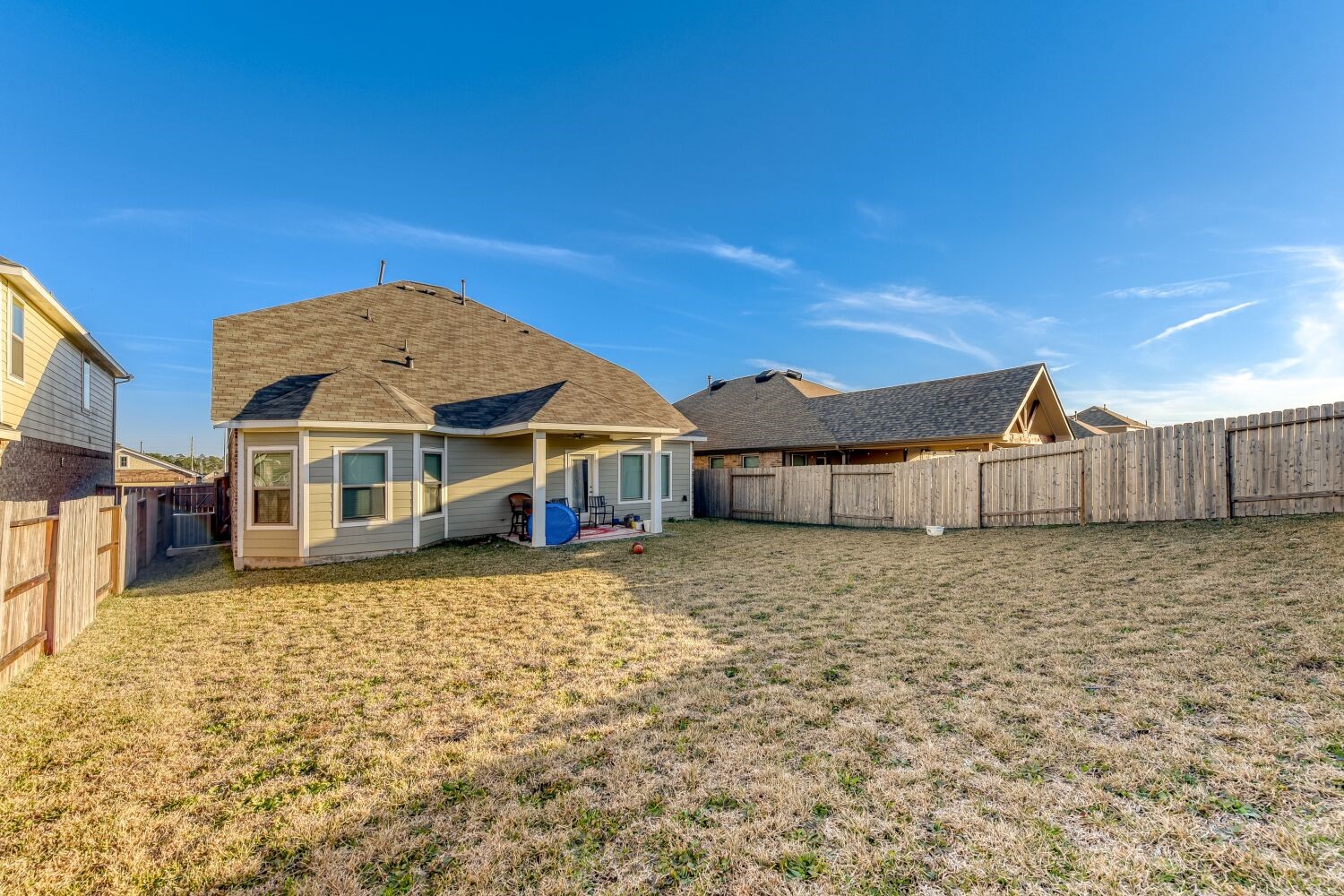 437 Ridge Palm Road Magnolia, TX 77354 - Photo 28 of 31 a view of a house with a yard