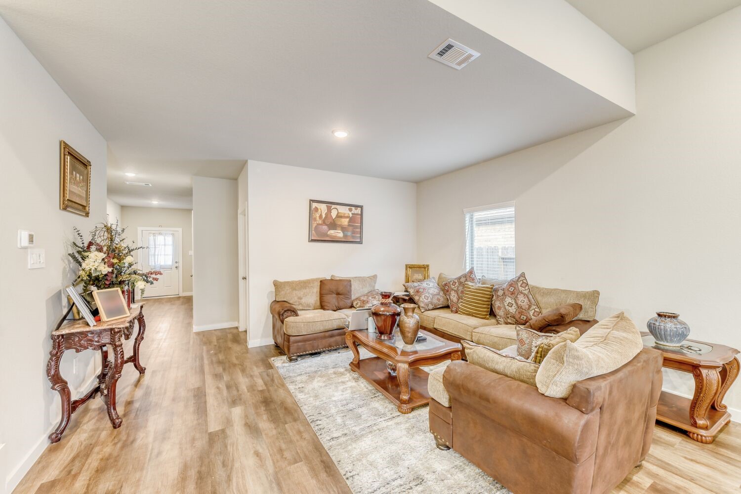 437 Ridge Palm Road Magnolia, TX 77354 - Photo 3 of 31 a living room with furniture and a wooden floor