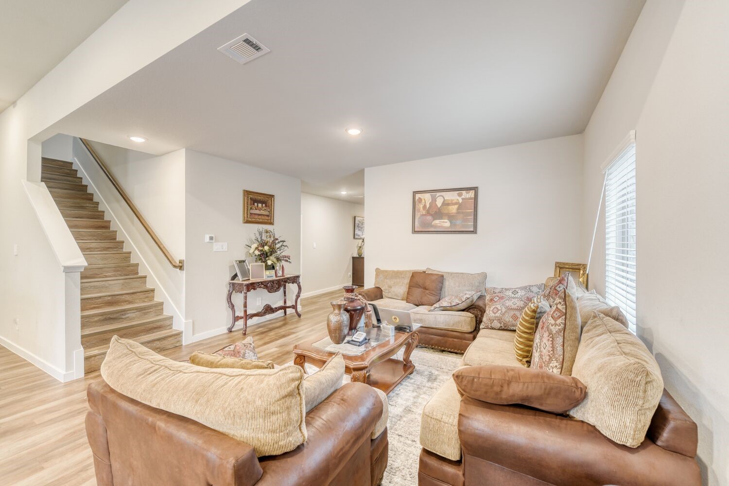 437 Ridge Palm Road Magnolia, TX 77354 - Photo 4 of 31 a living room with furniture and wooden floor