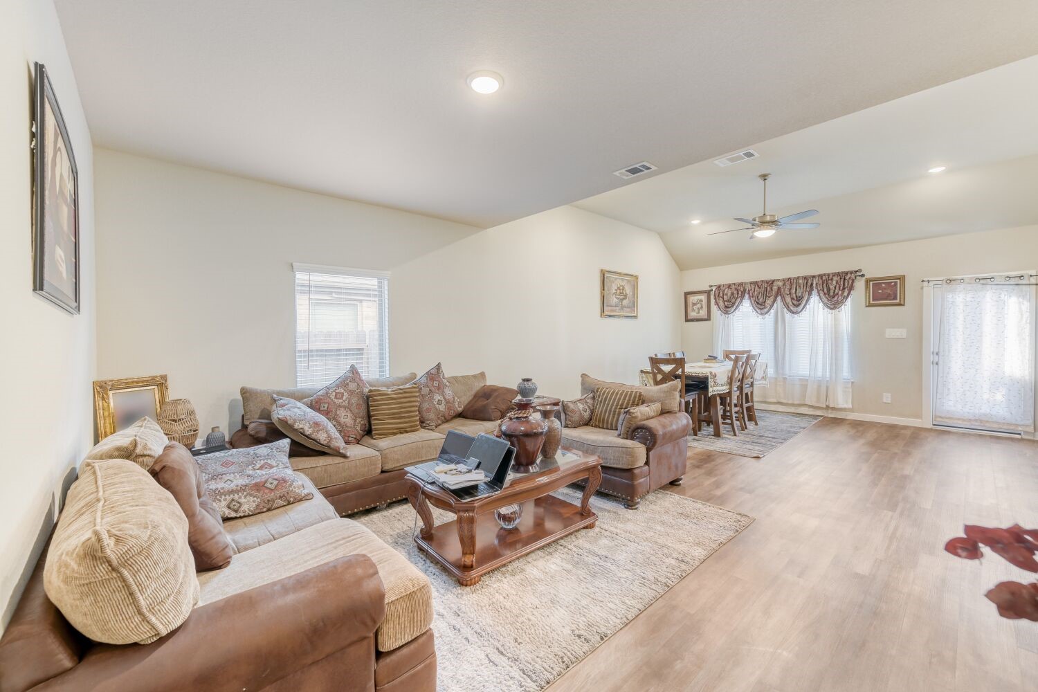 437 Ridge Palm Road Magnolia, TX 77354 - Photo 5 of 31 a living room with furniture and wooden floor