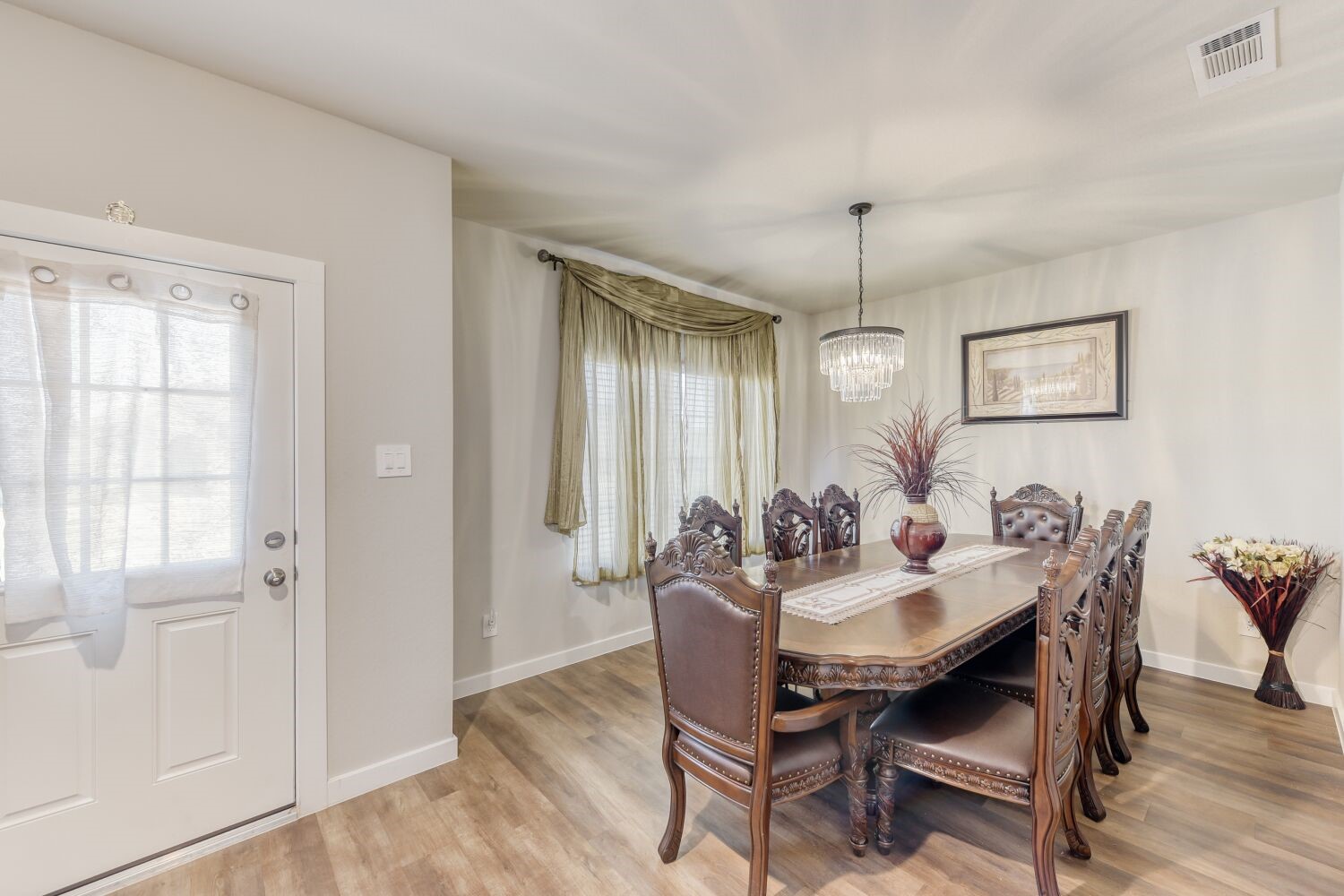 437 Ridge Palm Road Magnolia, TX 77354 - Photo 6 of 31 a dining room with furniture window and wooden floor