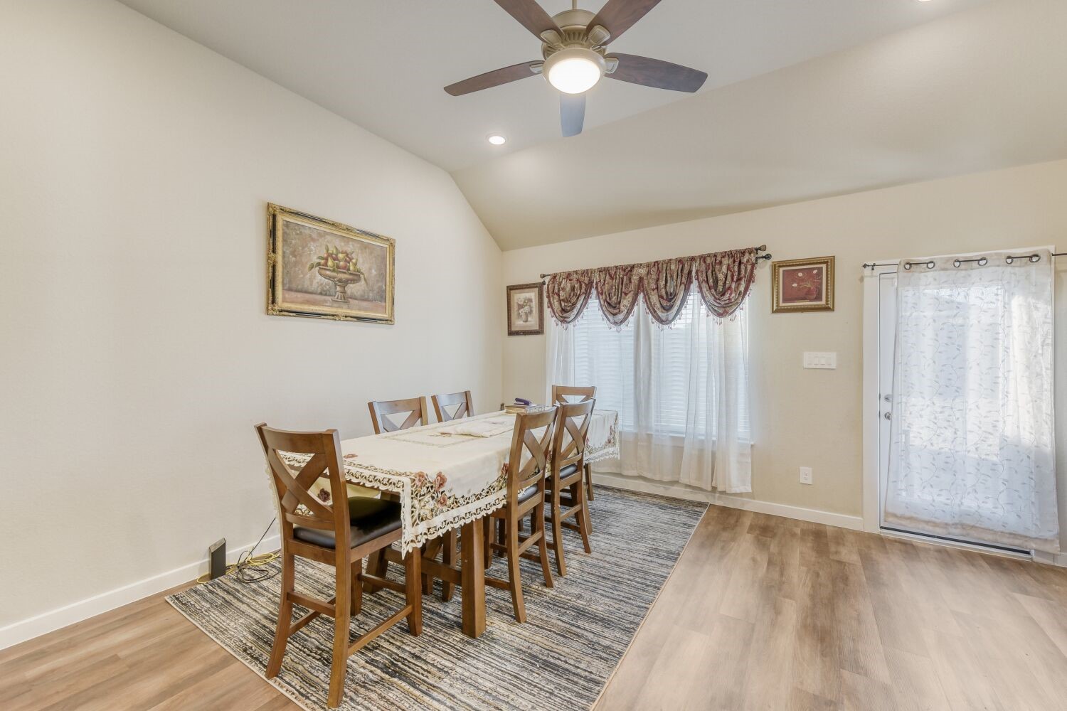 437 Ridge Palm Road Magnolia, TX 77354 - Photo 8 of 31 a view of a dining room with furniture and wooden floor