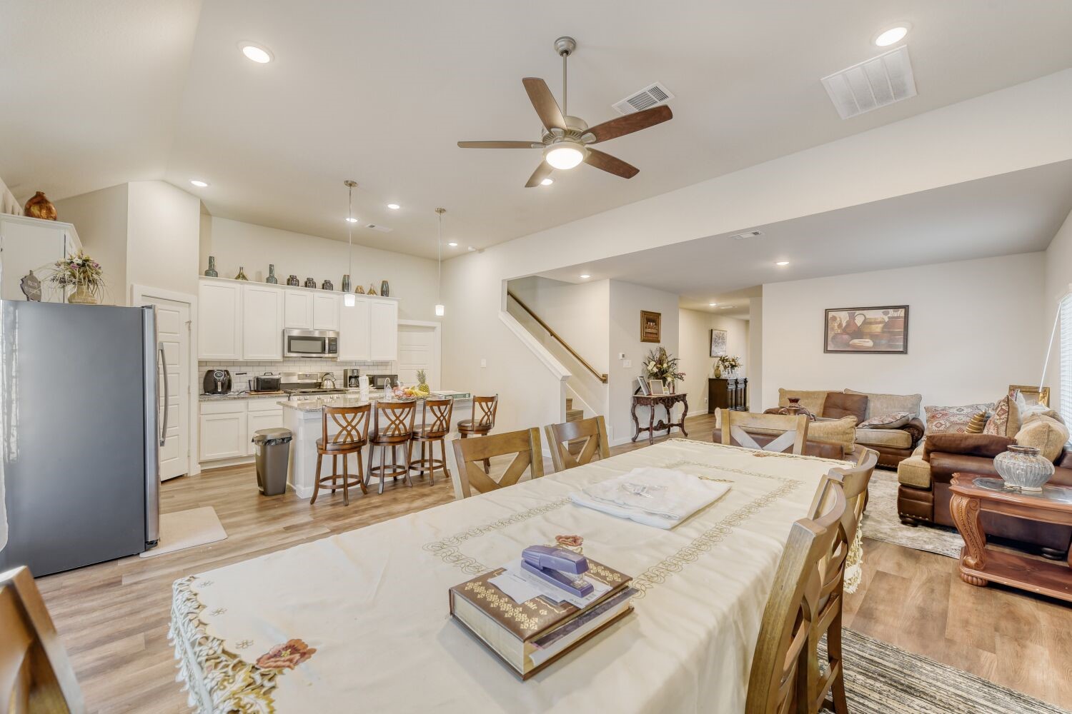 437 Ridge Palm Road Magnolia, TX 77354 - Photo 10 of 31 a living room with lots of furniture and kitchen view