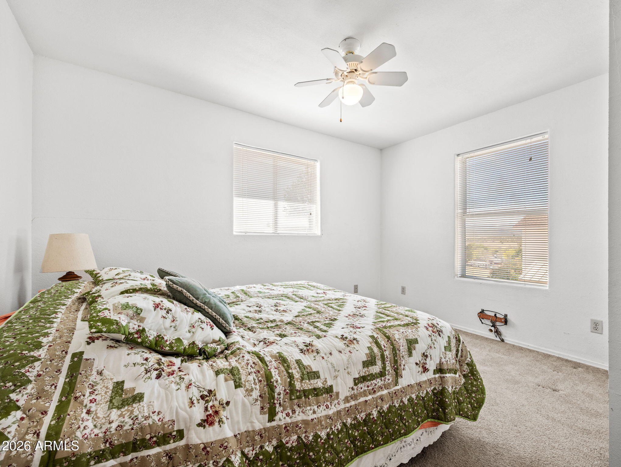 18420 Peeples Valley Road Peeples Valley, AZ 86332 - Photo 17 of 31 a bedroom with a bed and a window