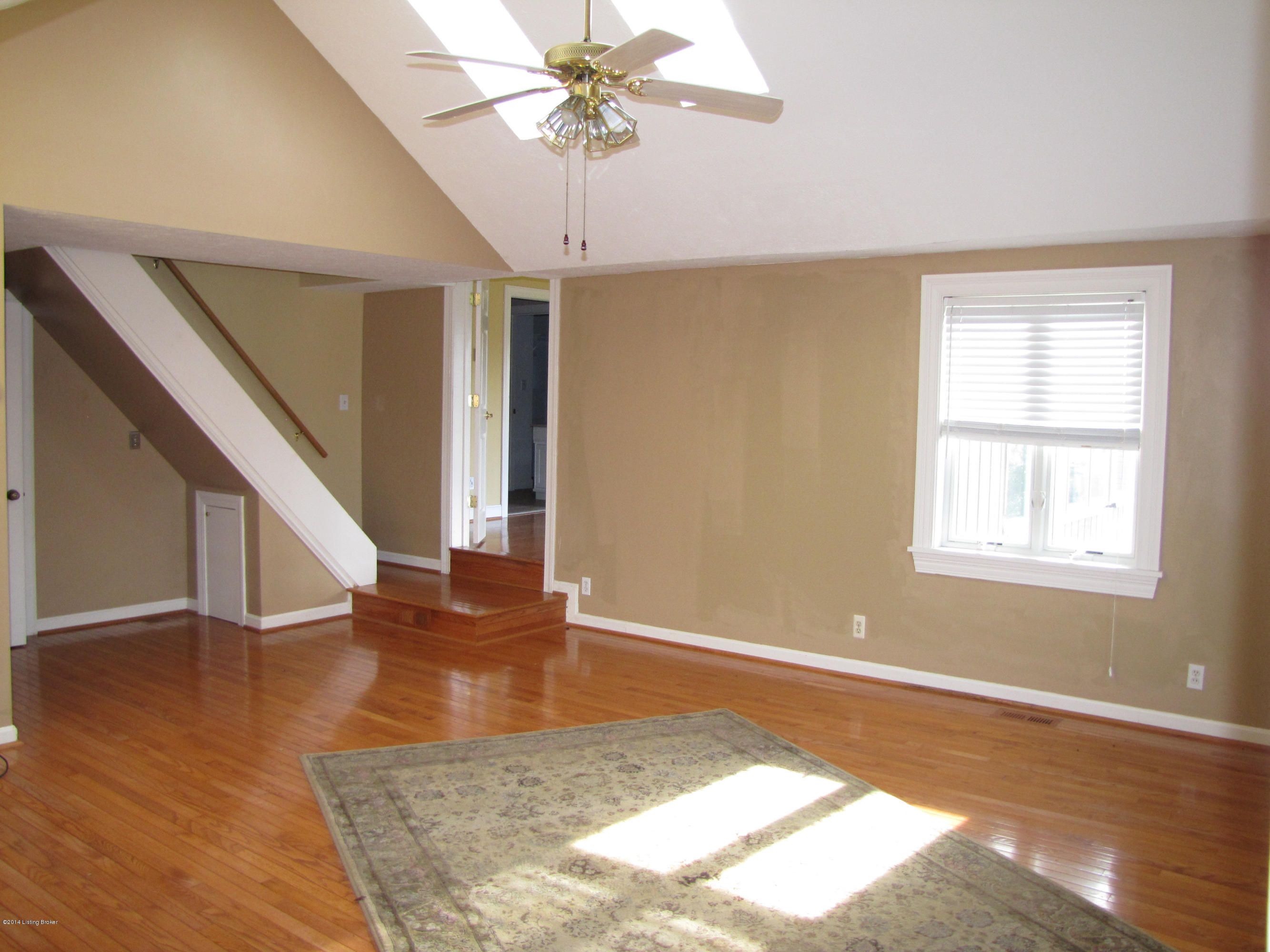 2104 Cardinal Harbour Road Prospect, KY 40059 - Photo 56 of 68 The Great Room is complete with hardwood flooring, a bay window with window seat, vaulted ceiling with double sky lights, a ceiling fan/light, and storage closet